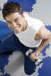 Man lifting dumbbell