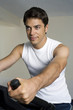 Man sitting on exercise bike