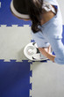 Woman standing on weight scale