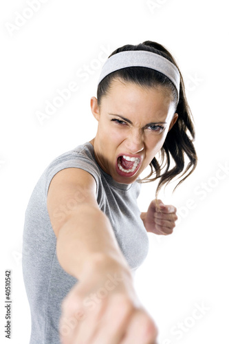 Photo: Woman shouting while punching Woman shouting while punching