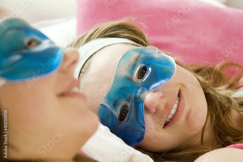 Photo: Girls wearing eye masks Girls wearing eye masks