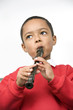 Boy playing the recorder