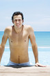 Man coming out from the swimming pool