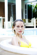 Woman relaxing in a jacuzzi