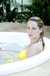 Woman relaxing in a jacuzzi