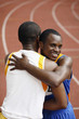 Men hugging each other after the race