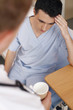 Photo: Doctor attending to his patient Doctor attending to his patient