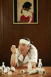 Man with his eyes half closed after a few cups of sake