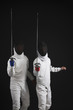 Two men holding fencing foils