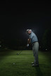 Man preparing to putt