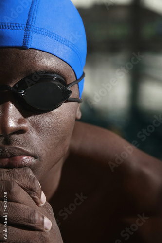 Photo: Man with swimming cap and goggles Man with swimming cap and goggles