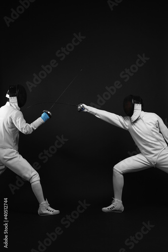 Photo: Man attacking his opponent Man attacking his opponent