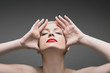 Woman posing with her eyes closed