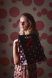 Woman with paperbag posing for the camera