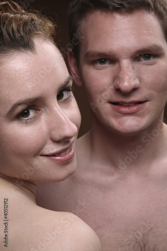Photo: Man and woman looking at the camera Man and woman looking at the camera