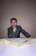 Businessman examining wooden blocks on the table