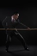 Photo: Businessman pulling a rope Businessman pulling a rope