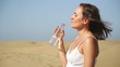 Video: Young woman drinking water on the desert Young woman drinking water on the desert