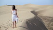 Video: Young woman running on the desert, slow motion Young woman running on the desert, slow motion