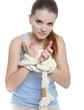young woman with tied up hands over white
