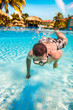 teenager floats in pool