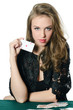The beautiful girl with playing card