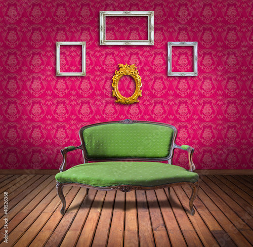 Photo: vintage luxury armchair and frame in pink wallpaper room vintage luxury armchair and frame in pink wallpaper room