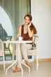 Happy woman speaking mobile phone at terrace Happy woman speaking mobile phone at terrace