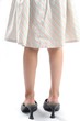 Grown-up girl, wearing her mother's heels.