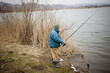An angler casting his rod