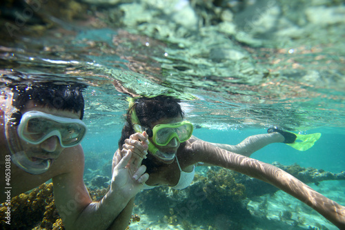 Photo: Couple snorkeling in Caribbean waters Couple snorkeling in Caribbean waters