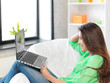 happy woman with laptop computer