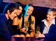 Foto: Young happy people with champagne at party Young happy people with champagne at party