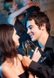 Foto: Couple with glasses of champagne on date Couple with glasses of champagne on date