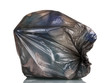black garbage bag with trash isolated on white