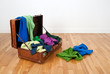 Photo: Leather suitcase full of colorful clothing Leather suitcase full of colorful clothing