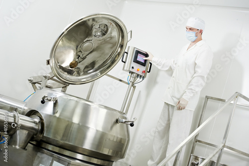 Photo: pharmaceutical factory worker pharmaceutical factory worker
