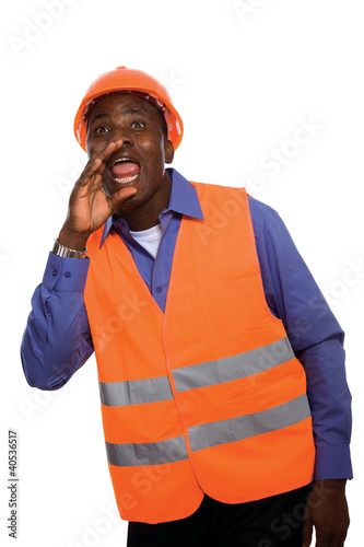 Photo: A black man African American Construction Worker on a job site. A black man African American Construction Worker on a job site.