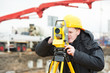 Photo: surveyor works with theodolite surveyor works with theodolite