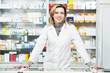 Pharmacy chemist woman in drugstore