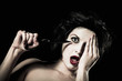 Photo: Beautiful young girl poking her eye out with scissors Beautiful young girl poking her eye out with scissors