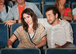 Man Flirting in Theater