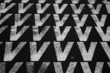 White letter v