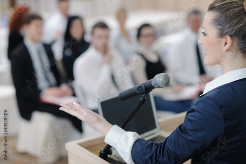 Photo: business woman giving presentation business woman giving presentation