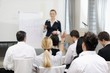 Photo: business woman giving presentation business woman giving presentation