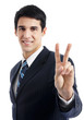 Businessman showing two fingers or victory sign