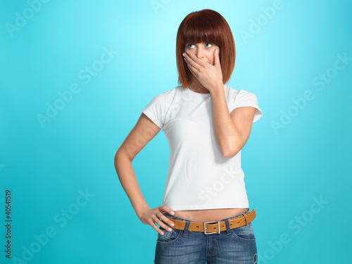 Photo: pretty young woman with surprised face expression pretty young woman with surprised face expression