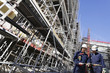 giant scaffoldings and construction workers