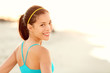 Fitness woman beach portrait