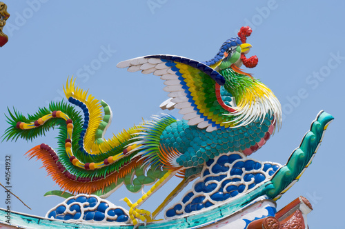 Photo: The Dragon status on roof of joss house The Dragon status on roof of joss house